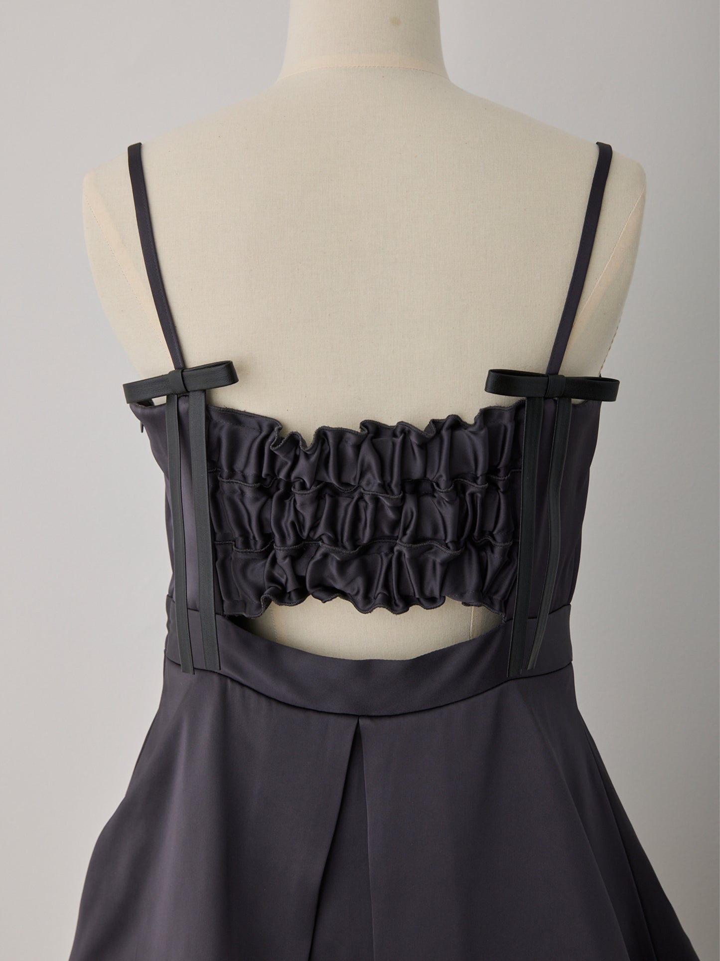 back ribbon peplum mini dress