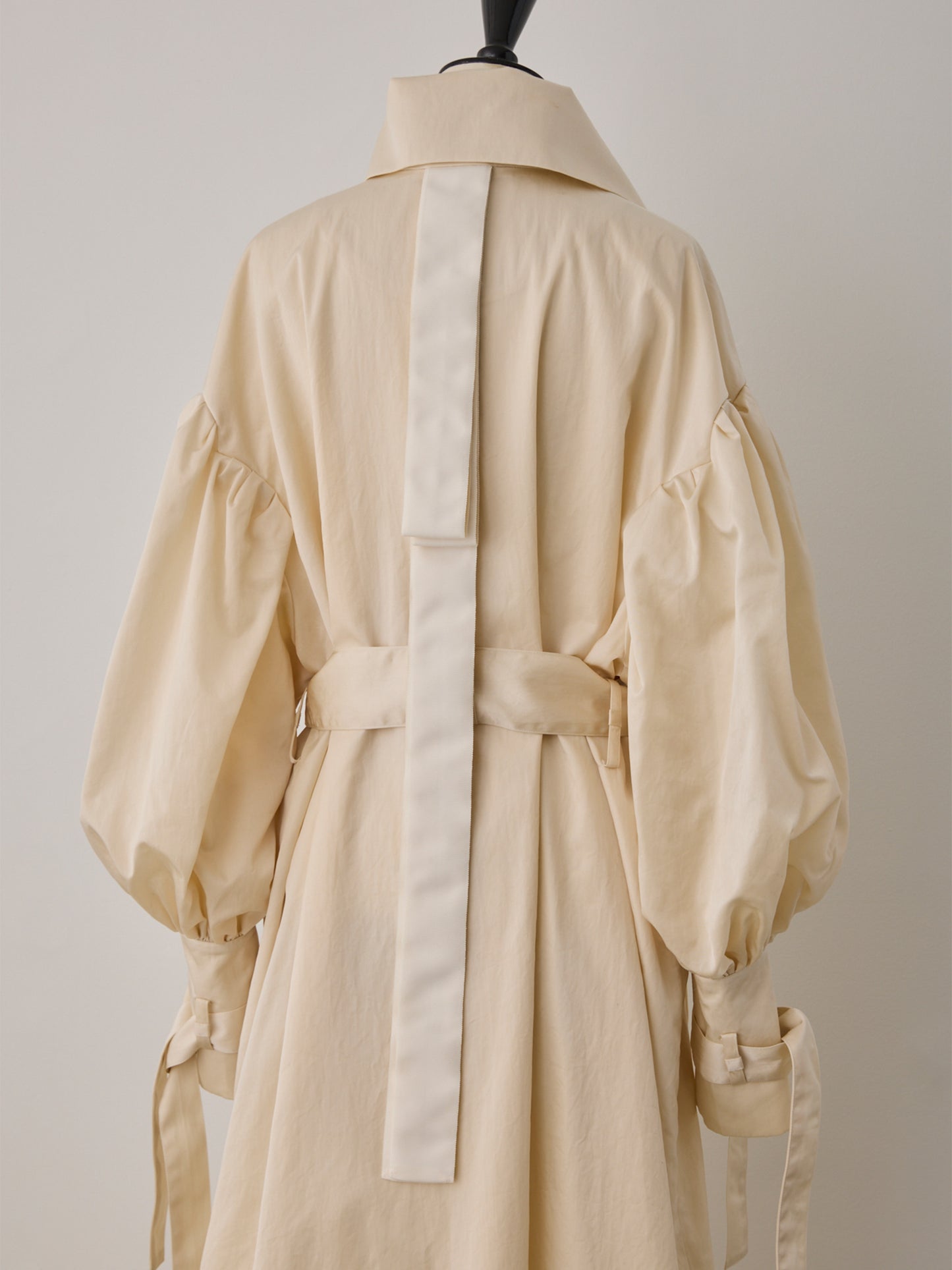 flower sleeve over coat