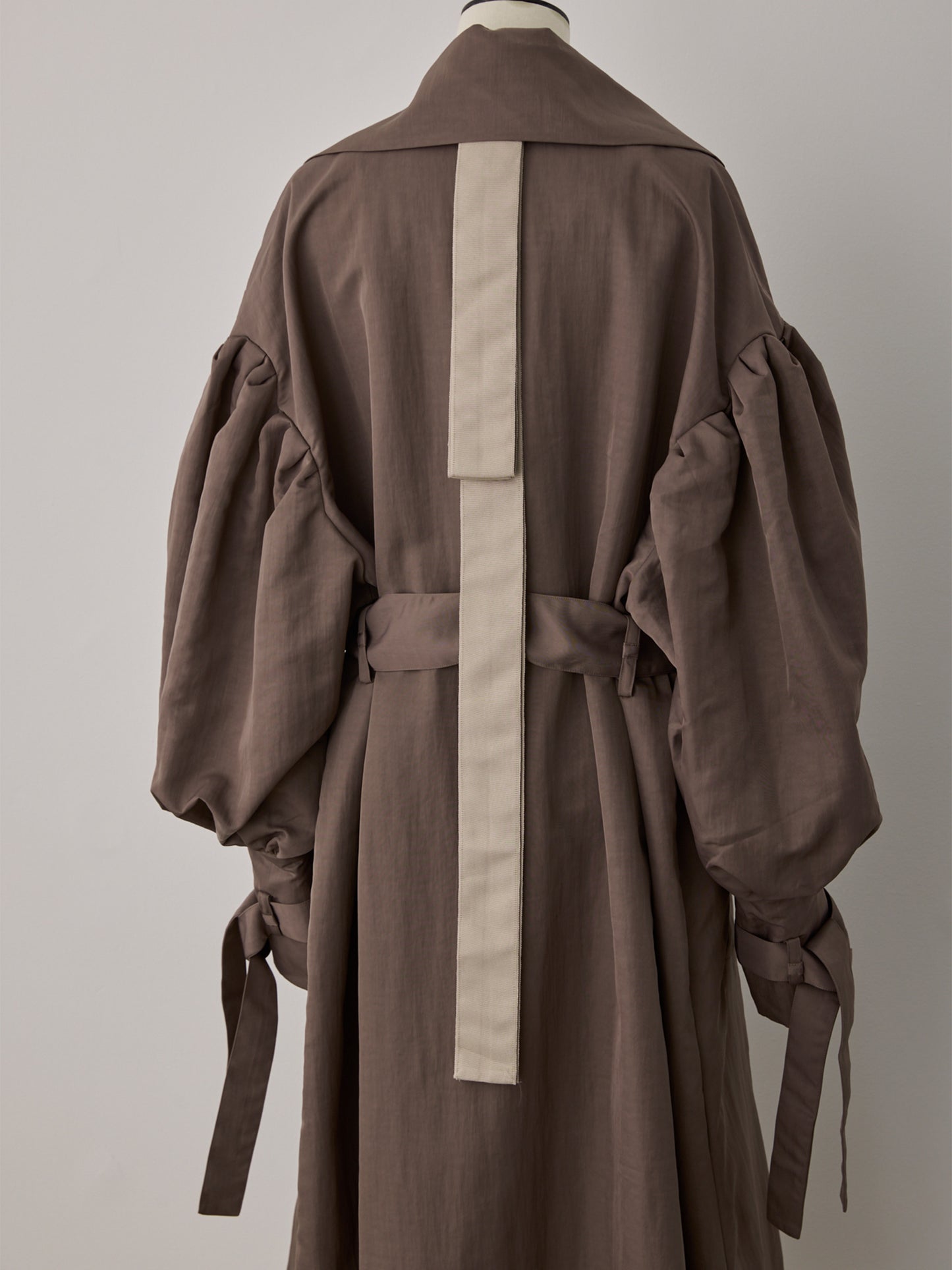 flower sleeve over coat